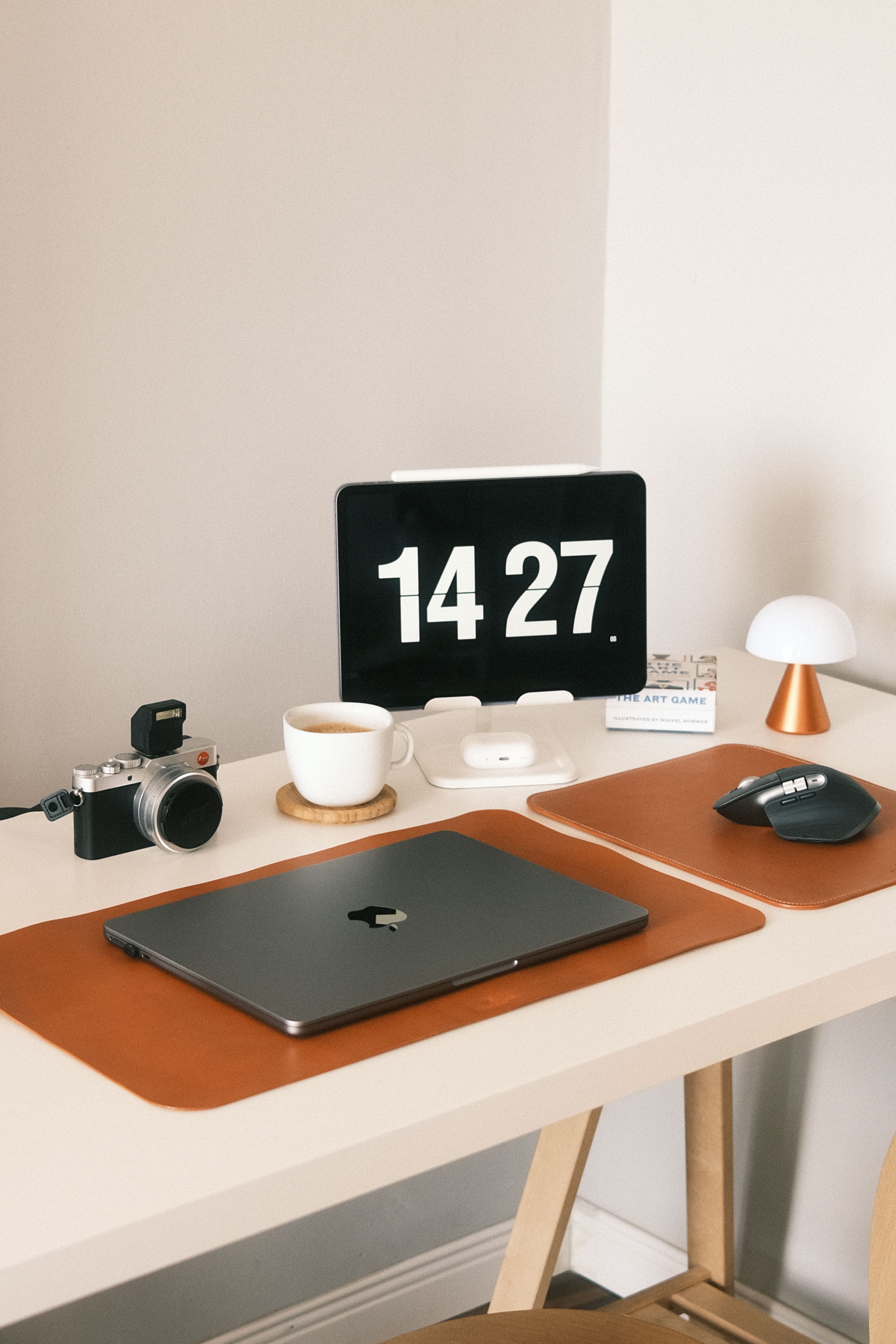 Organized desk with laptop and office supplies